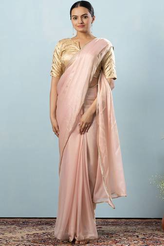 Peach plain tissue festive wear saree with blouse piece