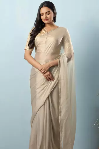 Green plain tissue festive wear saree with blouse piece