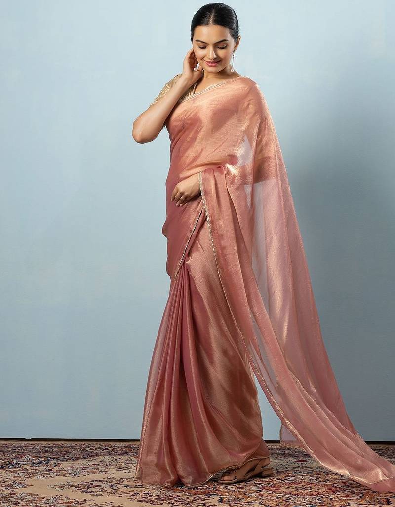 Pink plain tissue festive wear saree with blouse piece