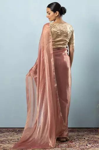 Pink plain tissue festive wear saree with blouse piece