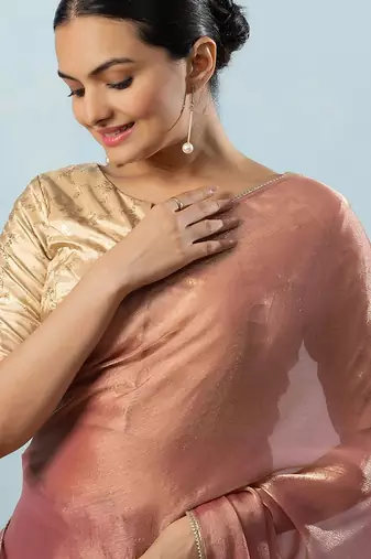 Pink plain tissue festive wear saree with blouse piece