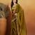 Green plain tissue festive wear saree with blouse piece