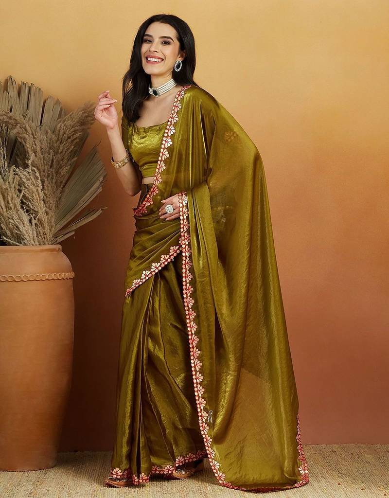 Green plain tissue festive wear saree with blouse piece