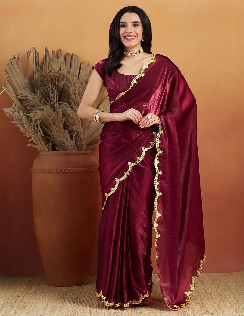 Maroon plain tissue festive wear saree with blouse piece
