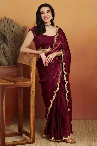 Maroon plain tissue festive wear saree with blouse piece