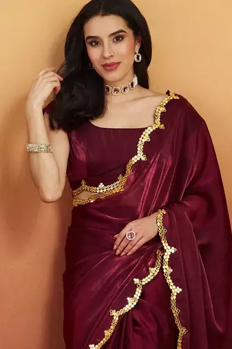Maroon plain tissue festive wear saree with blouse piece