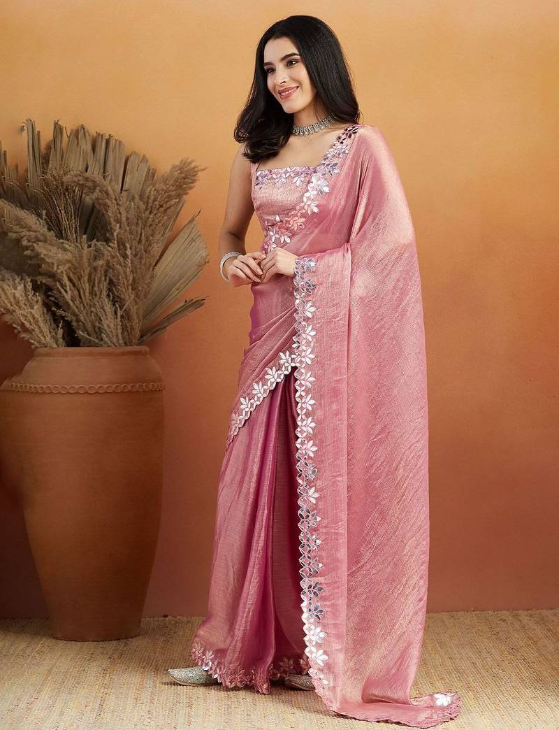 Pink plain tissue festive wear saree with blouse piece