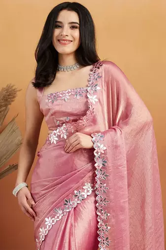 Pink plain tissue festive wear saree with blouse piece