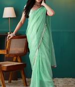 Green elegant printed organza saree with blouse piece