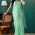 Green elegant printed organza saree with blouse piece