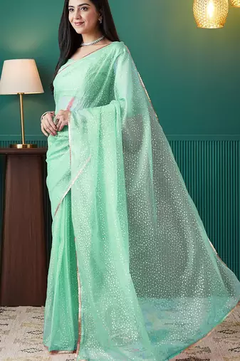 Green elegant printed organza saree with blouse piece