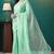 Green elegant printed organza saree with blouse piece