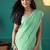 Green elegant printed organza saree with blouse piece