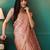 Peach elegant printed organza saree with blouse piece