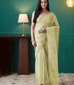 Green elegant printed organza saree with blouse piece