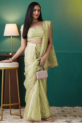 Green elegant printed organza saree with blouse piece