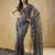 Black elegant printed organza saree with blouse piece