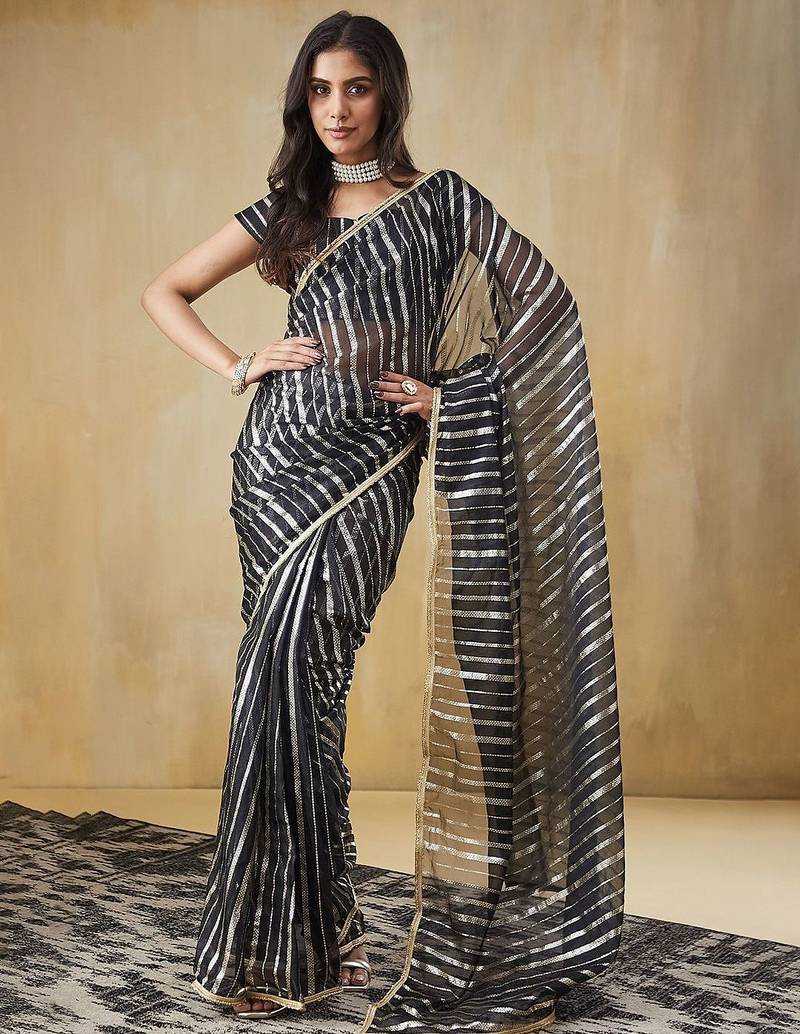 Black elegant printed organza saree with blouse piece