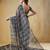 Black elegant printed organza saree with blouse piece