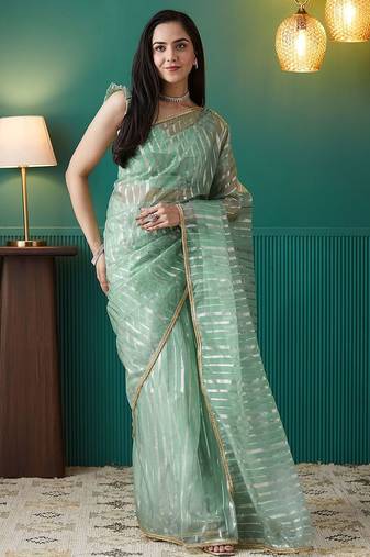 Green elegant printed organza saree with blouse piece