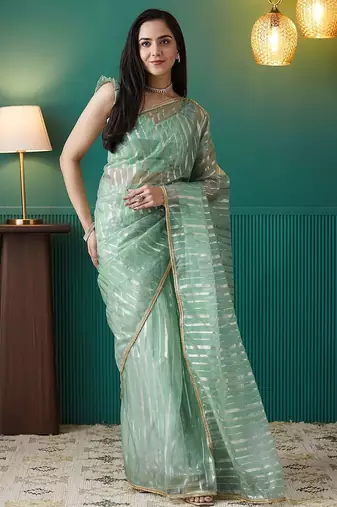 Green elegant printed organza saree with blouse piece
