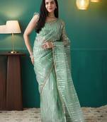 Green elegant printed organza saree with blouse piece