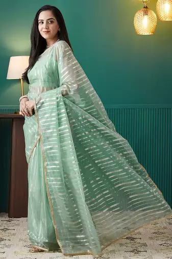 Green elegant printed organza saree with blouse piece
