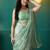 Green elegant printed organza saree with blouse piece