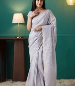 Purple elegant printed organza saree with blouse piece