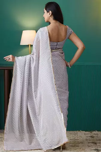 Purple elegant printed organza saree with blouse piece