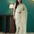 Green elegant printed organza saree with blouse piece