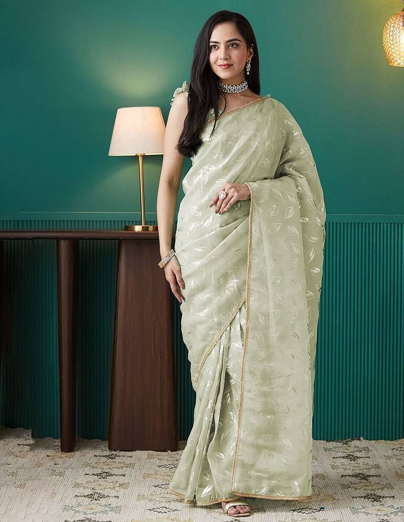 Green elegant printed organza saree with blouse piece