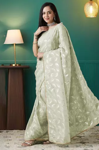 Green elegant printed organza saree with blouse piece