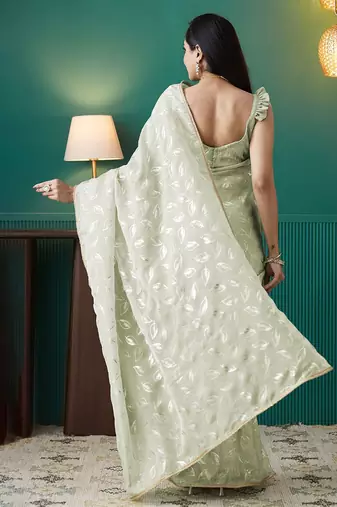 Green elegant printed organza saree with blouse piece