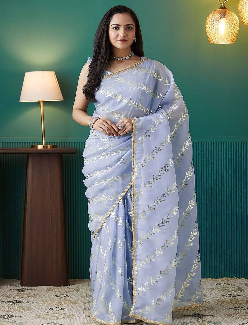 Purple elegant printed organza saree with blouse piece