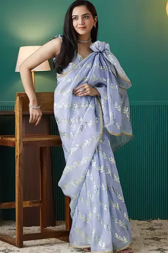 Purple elegant printed organza saree with blouse piece