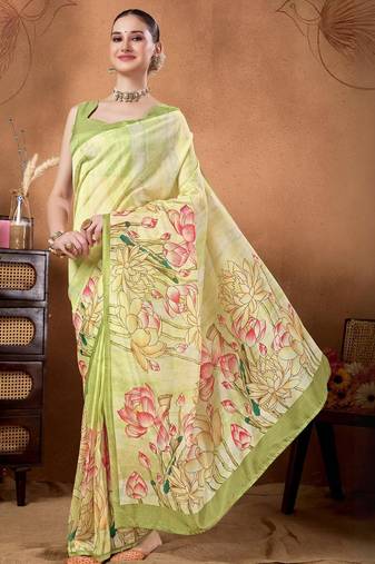 Green elegant printed organza saree with blouse piece