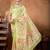 Green elegant printed organza saree with blouse piece
