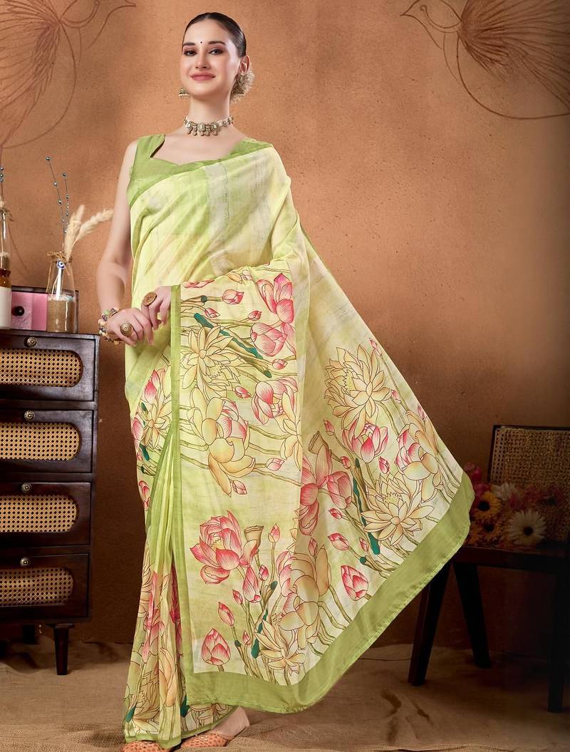Green elegant printed organza saree with blouse piece