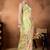 Green elegant printed organza saree with blouse piece