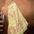 Green elegant printed organza saree with blouse piece
