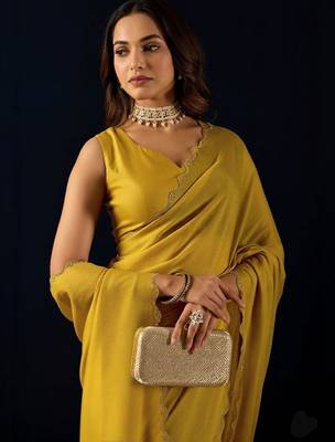 Yellow plain georgette designer saree with blouse piece 1