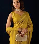 Yellow plain georgette designer saree with blouse piece