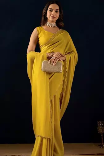 Yellow plain georgette designer saree with blouse piece