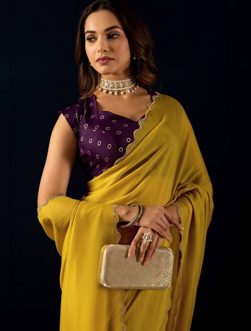 Yellow plain georgette designer saree with blouse piece