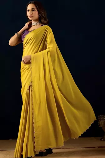 Yellow plain georgette designer saree with blouse piece