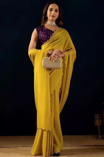 Yellow plain georgette designer saree with blouse piece