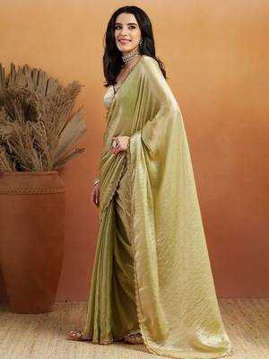Green plain tissue festive wear saree with blouse piece 1