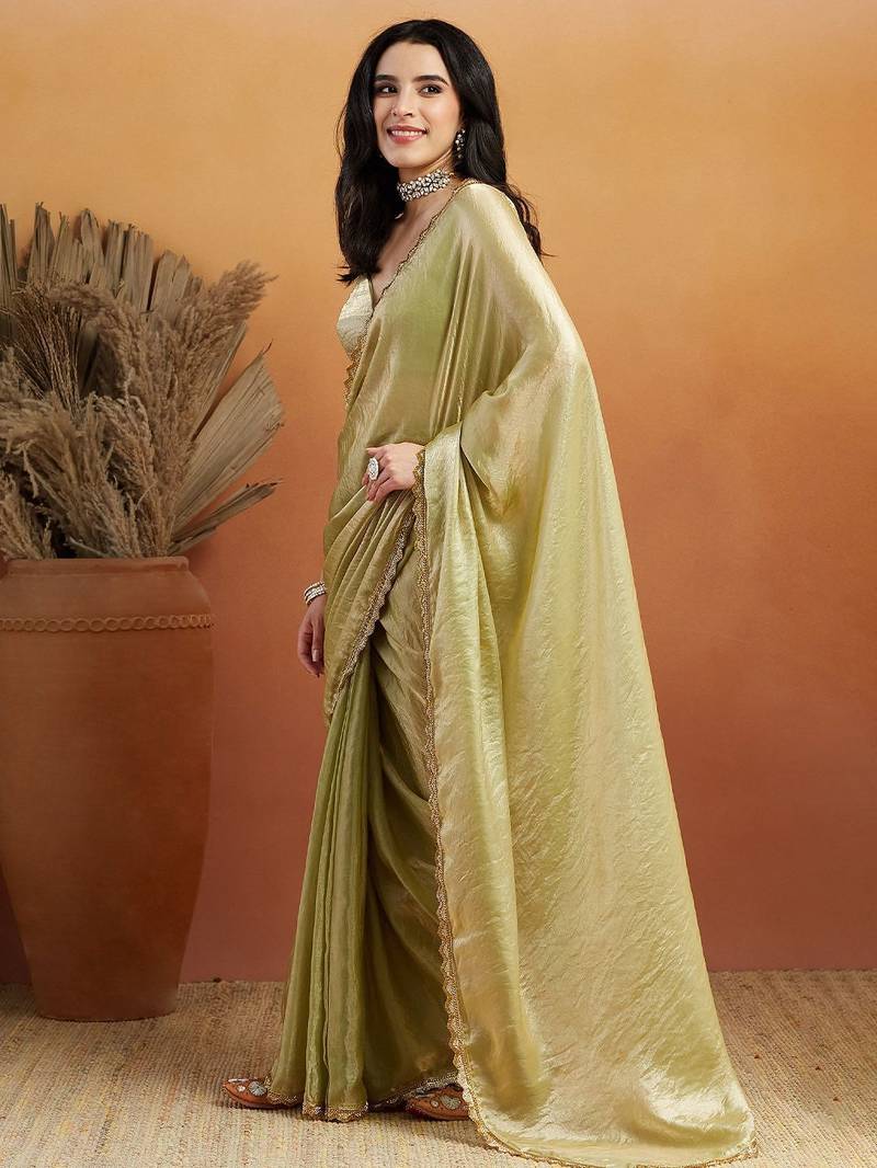 Green plain tissue festive wear saree with blouse piece
