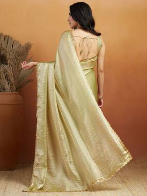 Green plain tissue festive wear saree with blouse piece 2